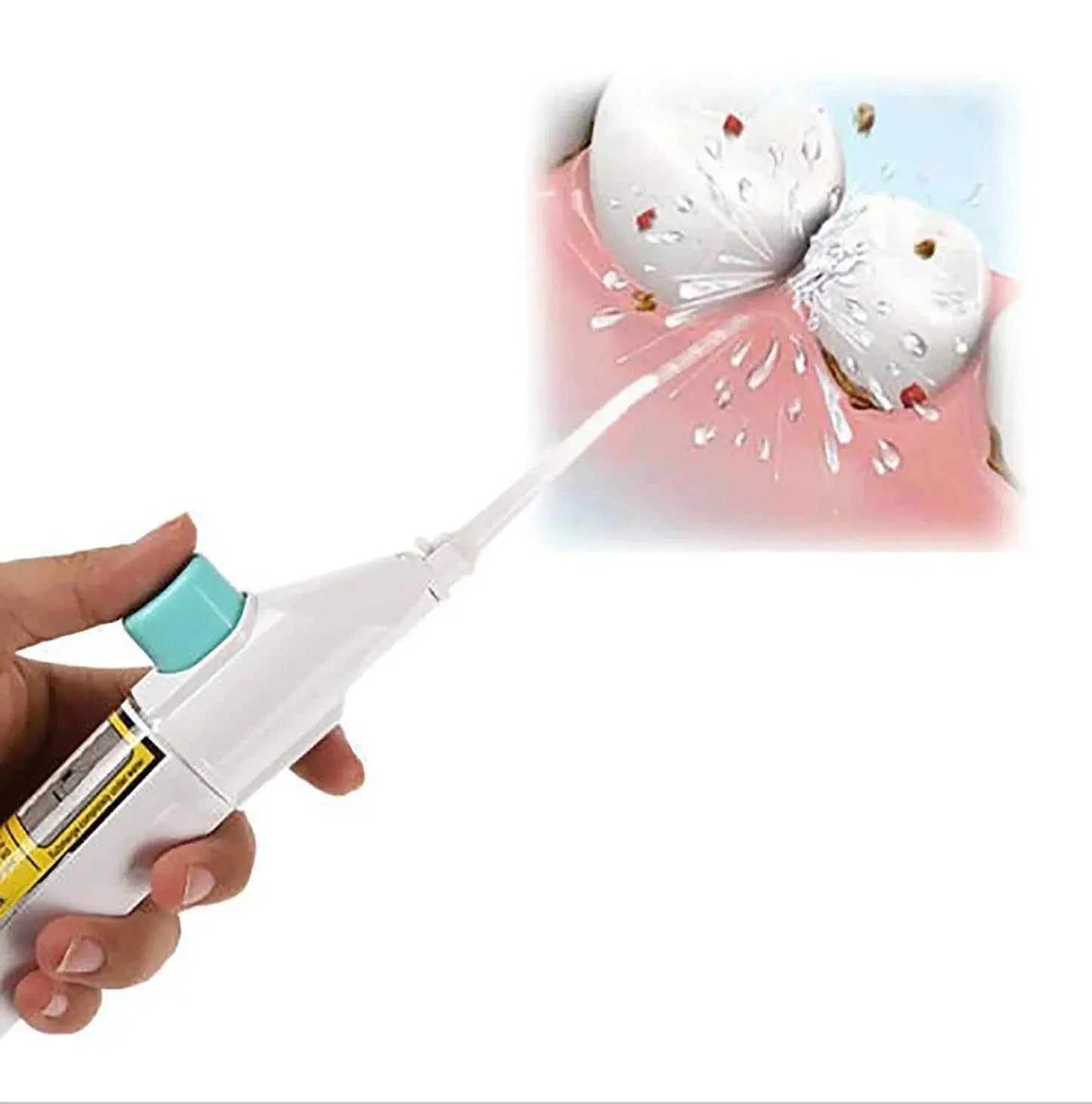 Handheld dental water flosser spraying water to clean between teeth and gums